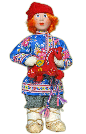 Мальчик с игрушкой, народная кукла